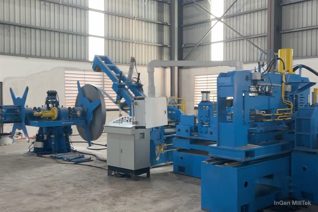 Entry section at a tube mill: double-side hydraulic uncoiler, peeler and hold-down, and shear and butt welder